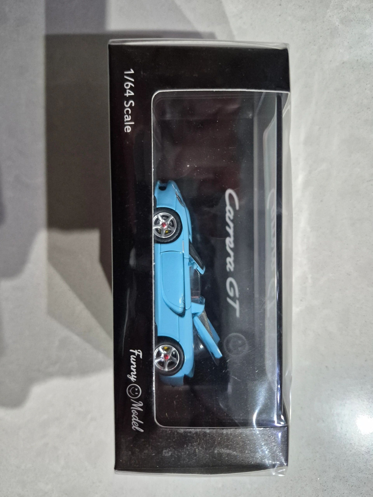 FUNNY MODEL 1:64 - Porsche Carrera GT Blue