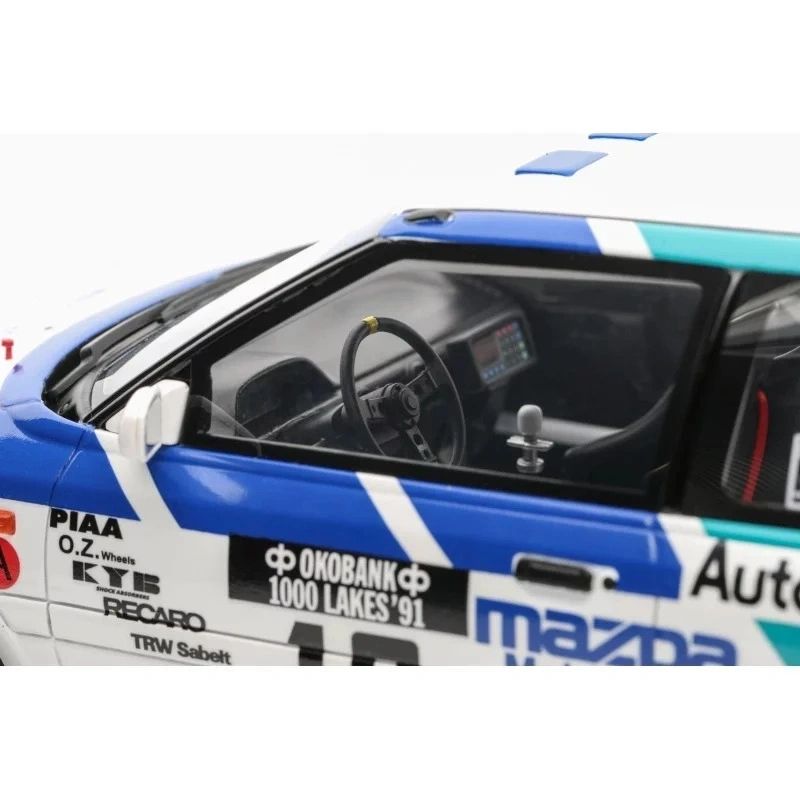 OTTOMOBILE 1:18 - Mazda 323 GTX #10 5° Rallye 1000 Lakes 1991 Mäkinen-Harjanne