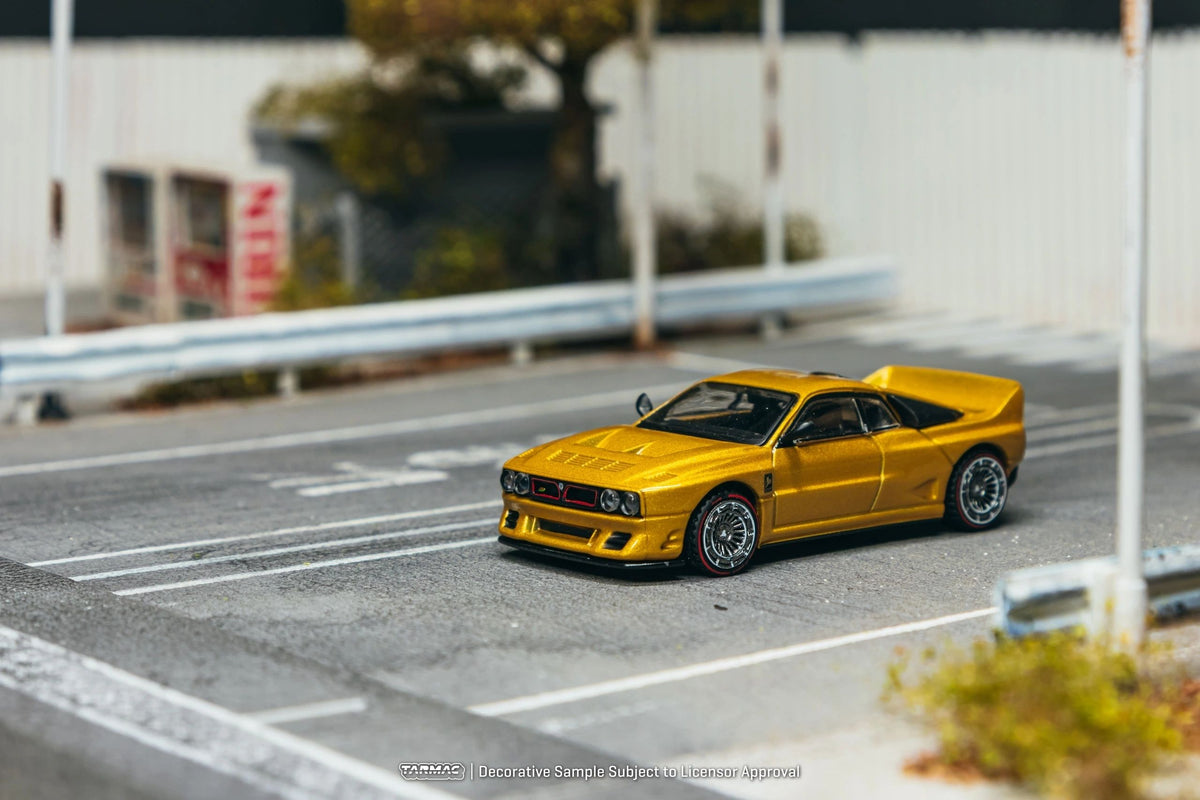 **PRE-ORDER** TARMAC - 1:64 KIMERA EVO38 GOLD 2026